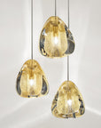 Terzani Mizu Pendant Light Spacio India in gold dust on a clear background