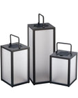 Three rectangular solar lanterns with black frames and reflective surfaces on a white background
