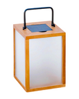 Solar lantern with wooden frame and white glass on a white background