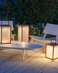 Outdoor setting with solar-powered lamps on a patio by Les Jardins available at Spacio retail stores in Mumbai & Kolkata.