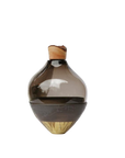Decorative sculptural vase with a wooden top and base on a white background from Utopia & Utility, available at Spacio retail stores in Mumbai & Kolkata.