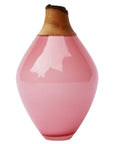 Pink vase with a wooden top on a white background