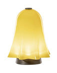 Yellow bell-shaped lamp on a white background from Venini at Spacio store in Mumbai
