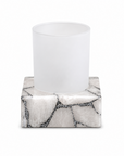 Bathroom sinktop tumbler with white quartz and silver accents on a white background