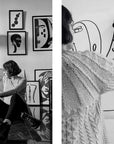 A black and white photo of a woman, Affreschi Inner Line Collection, drawing on a wall.