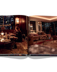 Assouline New York Chic coffee table book displaying photos of Candle light luxury Dinner in interior of New York City on white back ground available at Spacio India for luxury home decor accessories collection of Travel Coffee Table Books.