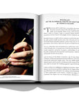Assouline Buccellati: A Century of Timeless Beauty coffee table book displaying Jewellery crafting artist working on jewel piece on a white background at Spacio India for luxury home decor collection of Jewellery Coffee Table Books.
