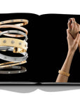 Assouline Buccellati: A Century of Timeless Beauty coffee table book displaying Gold & Silver Bracelets & a lady wering bracelet on a white background at Spacio India for luxury home decor collection of Jewellery Coffee Table Books.