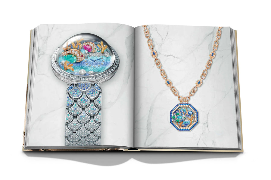 Assouline Bvlgari: Beyond Time coffee table book displaying DIVAS' DREAM Acquarium High Jewellery watch & Necklace on white back ground at Spacio India for luxury home decor collection of Jewellery Coffee Table Books.