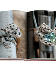 Assouline Cartier: Panthere coffee table book displaying Cartier PANTHÈRE DE CARTIER Engagement rings on white back ground at Spacio India for luxury home decor collection of Jewellery Coffee Table Books.