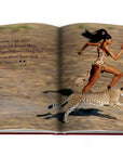 Assouline Cartier: Panthere coffee table book displaying Model Naomi Campbell running with a Panther on white back ground at Spacio India for luxury home decor collection of Jewellery Coffee Table Books.