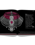 Assouline Cartier: The Impossible Collection coffee table book displaying Cartier Reine Makeda Necklace on white back ground available at Spacio India for luxury home decor collection of Ultimate & Jewellery Coffee Table Books.