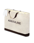 Assouline Cartier: The Impossible Collection coffee table book in Assouline hand bag on white back ground available at Spacio India for luxury home decor collection of Ultimate & Jewellery Coffee Table Books.