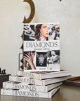 Assouline Diamonds: Diamonds Stories coffee table book on a surface in modern interior available at Spacio India for luxury home decor collection of Jewellery Coffee Table Books.