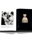 Assouline Dior by Marc Bohan coffee table book displaying photo of Spring/Summer 1961. Worn by Elizabeth Taylor and Gina Lollobrigida on a white back ground available at Spacio India for luxury home decor collection of Fashion Coffee Table Books.