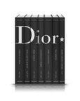 Assouline Dior by Marc Bohan coffee table book sets from different fashion designers on a white back ground available at Spacio India for luxury home decor collection of Fashion Coffee Table Books.