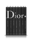 Assouline Dior by Marc Bohan coffee table book sets from different fashion designers on a white back ground available at Spacio India for luxury home decor collection of Fashion Coffee Table Books.