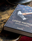 Assouline Louis Vuitton Manufactures coffee table book on coffee table available at Spacio India for luxury home decor collection of Fashion Coffee Table Books.