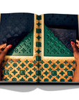 Assouline Louis Vuitton Manufactures coffee table book displaying photo of Louis Vuitton Green & Yellow Pattern on white background at Spacio India for luxury home decor collection of Fashion Coffee Table Books.