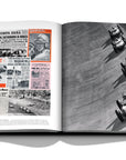 Assouline Formula 1: The Impossible Collection coffee table book 1961 Italian Grand Prix & newspaper article on a white back ground available at Spacio India for luxury home decor collection of Ultimate & Sports Coffee Table Books.