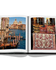 Assouline Italian Chic coffee table book displaying photo of Grand Canal & cushions from Italy restaurants spaces from Italy a white back ground available at Spacio India for luxury home decor collection of Travel Coffee Table Books.
