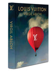 Side look of Assouline Louis Vuitton: Virgil Abloh Classic Balloon Cover coffee table book on a white back ground available at Spacio India for luxury home decor accessories collection of Fashion Coffee Table Books.