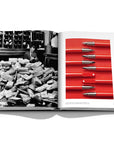 Assouline Montblanc coffee table book displaying vintage picture of Postal Worker & RED collection in collaboration with the (RED) foundation, 2019 available at Spacio India for luxury home decor accessories collection of Fashion Coffee Table Books.