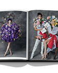 Assouline Moschino coffee table book displaying photos of fashion dresses by American fashion designer Jeremy Scott wore by Models on a white back ground available at Spacio India for luxury home decor accessories collection of Fashion Coffee Table Books.