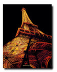 The back page of Assouline Paris Chic coffee table book displaying photo of low angle of Eiffel Tower on white back ground available at Spacio India for luxury home decor accessories collection of Travel Coffee Table Books.