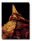 The back page of Assouline Paris Chic coffee table book displaying photo of low angle of Eiffel Tower on white back ground available at Spacio India for luxury home decor accessories collection of Travel Coffee Table Books.