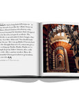 Assouline Paris Chic coffee table book displaying photos of Round Stairwell on white back ground available at Spacio India for luxury home decor accessories collection of Travel Coffee Table Books.
