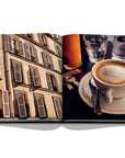 Assouline Paris Chic coffee table book displaying photos of Paris Apartments Windows & Cup of Coffee on white back ground available at Spacio India for luxury home decor accessories collection of Travel Coffee Table Books.