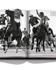 Assouline Polo Heritage Coffee Table Book displaying Photos of polo players playing a sport clicked by photographer Aline Coquelle on a white back ground available at Spacio India for luxury home decor accessories collection of Sports Coffee Table Books.
