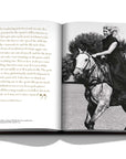 Assouline Polo Heritage Coffee Table Book displaying vintage photo of a lady on horse on a white back ground available at Spacio India for luxury home decor accessories collection of Sports Coffee Table Books.