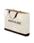 Assouline Coffee Table Book The Impossible Collection of Wine in a beige carry bag on a white back ground available at Spacio India for luxury home decor accessories collection of Ultimate Coffee Table Books.
