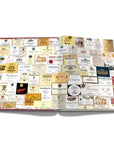 Assouline Coffee Table Book The Impossible Collection of Wine Limited Edition page displaying photo of various vintage stamps on a white back ground available at Spacio India for luxury home decor accessories collection of Ultimate Coffee Table Books.