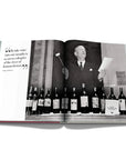 Assouline Coffee Table Book The Impossible Collection of Wine Limited Edition page of Wine Auction on a white back ground available at Spacio India for luxury home decor accessories collection of Ultimate Coffee Table Books.