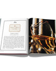 Assouline Coffee Table Book The Impossible Collection of Wine Limited Edition page displaying photo of close view of wine glass on a white back ground available at Spacio India for luxury home decor accessories collection of Ultimate Coffee Table Books.