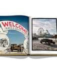 Assouline The Race of Gentlemen coffee table book displaying photo of Title of the book on board & Outdoor view of American hot rod culture on a white back ground available at Spacio India for luxury home decor accessories collection of Sports Coffee Table Books.