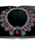Assouline Tiffany Co Vision and Virtuosity Icon Edition coffee table book displaying beautiful Necklace on a white back ground available at Spacio India for luxury home decor accessories collection of Jewellery Coffee Table Books.