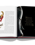 Assouline Cipullo: Making Jewelry Modern coffee table book displaying photo Two Masks' side angles with quote & Animal design Jewellery on a coffee table available at Spacio India for luxury home decor collection of Jewellery Coffee Table Books.