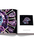 Assouline G Glenn: Spiro the art of a jewel coffee table book displaying photo of detailed Glenn Spiro Sapph Diam T Fan Earrings Maison G on a white back ground available at Spacio India for luxury home decor collection of Jewellery Coffee Table Books.