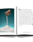 Assouline Windows at Tiffany & Co Icon Edition coffee table book page with necklace advertisement & text on white back ground available at Spacio India for luxury home decor accessories collection of Jewellery Coffee Table Books.