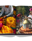 Assouline Jaipur Splendor coffee table book displaying photo of Kulhad Tea Seller & Marigold flowers at Jaipur on a white back ground available at Spacio India for luxury home decor accessories collection of Travel Coffee Table Books.