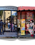 Assouline Tokyo Chic coffee table book page displaying Photos of Chanel Showroom & Japanese lady clicked by Andrea Fazzari on a white back ground available at Spacio India for luxury home decor accessories collection of Travel Coffee Table Books.