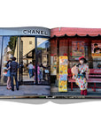 Assouline Tokyo Chic coffee table book page displaying Photos of Chanel Showroom & Japanese lady clicked by Andrea Fazzari on a white back ground available at Spacio India for luxury home decor accessories collection of Travel Coffee Table Books.