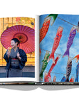 Assouline Tokyo Chic coffee table book page displaying an images of Japanese Carp Kites & Lady wearing Kimono with an umbrella on a white back ground available at Spacio India for luxury home decor accessories collection of Travel Coffee Table Books.