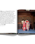 Assouline Tokyo Chic coffee table book page displaying an image of ladies wearing Japanese Clothes with information on a white back ground available at Spacio India for luxury home decor accessories collection of Travel Coffee Table Books.
