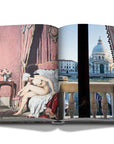 Assouline Venetian Chic coffee table book page picturing a view of places of Venice from bedroom on a white back ground available at Spacio India for luxury home decor accessories collection of Travel Coffee Table Books.