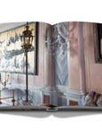 Assouline Venetian Chic coffee table book page picturing Baroque Interior space on a white back ground available at Spacio India for luxury home decor accessories collection of Travel Coffee Table Books.